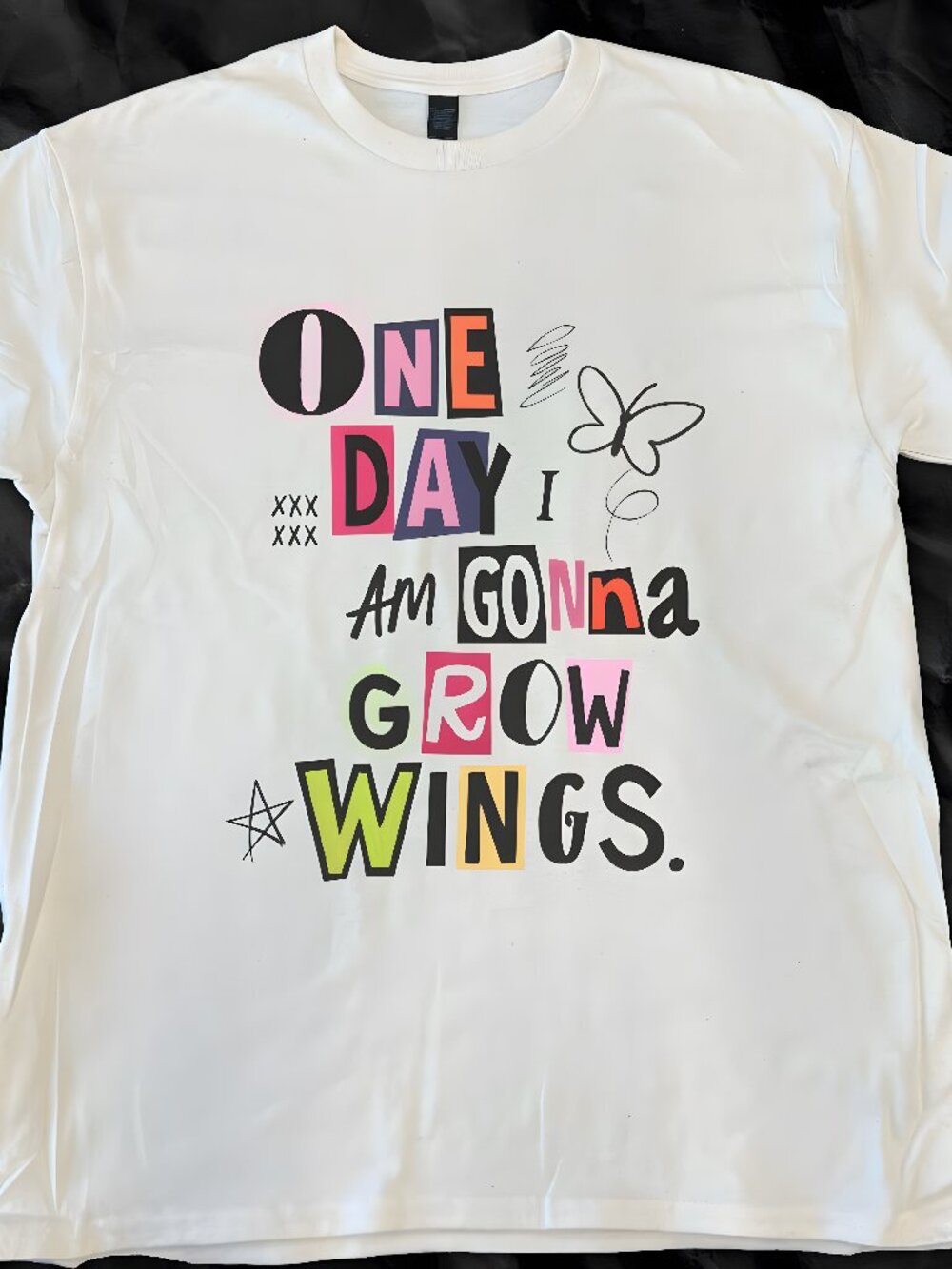 ONE DAY I’M GONNA GROW WINGS TEE White printed t-shirt